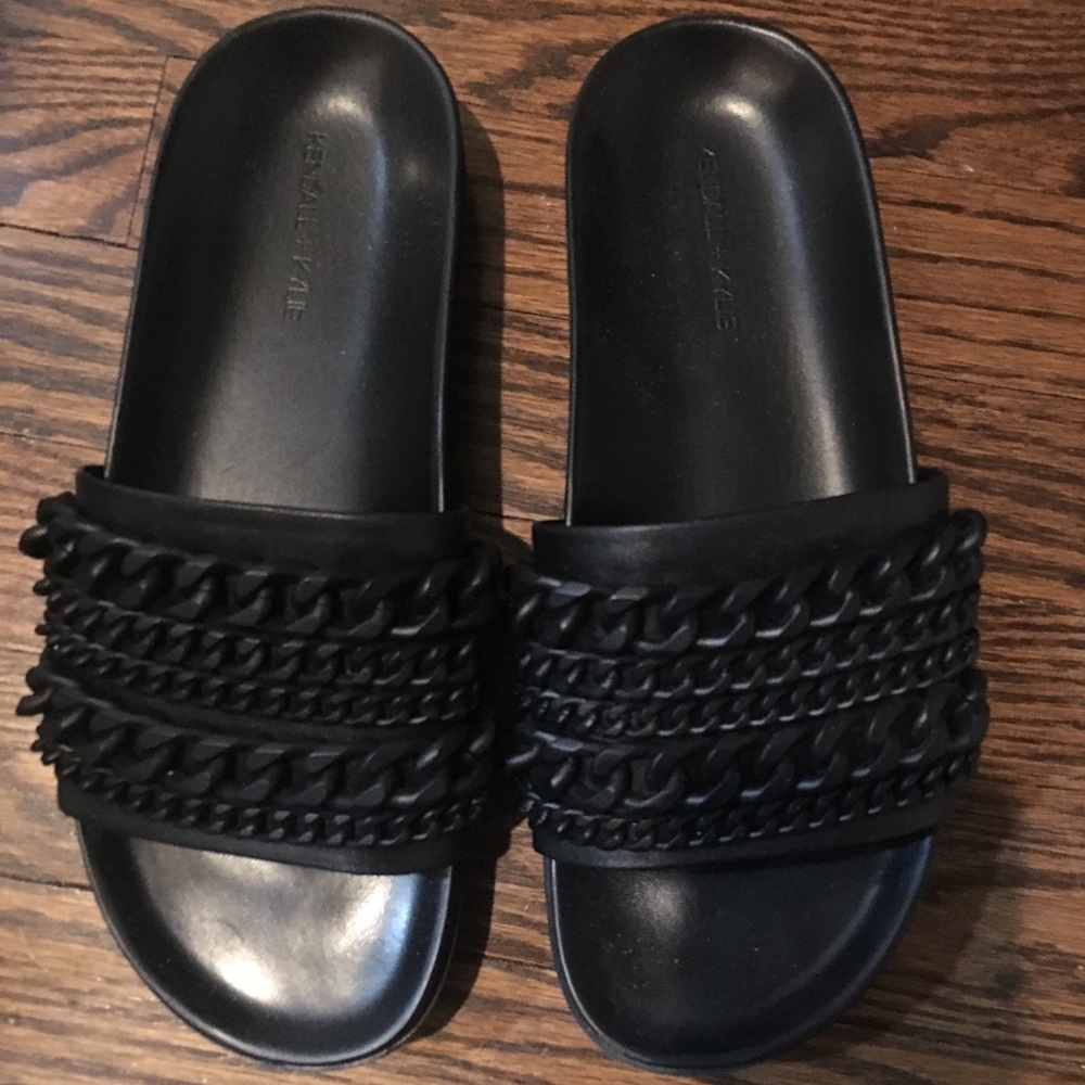 Kendall and Kylie Black pool slide